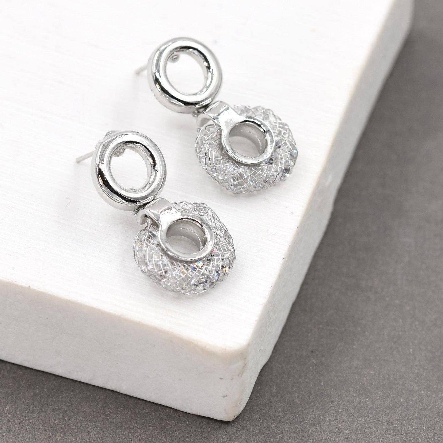 Tempest Designs - Disc shape earrings with post and circle drop componentÊ