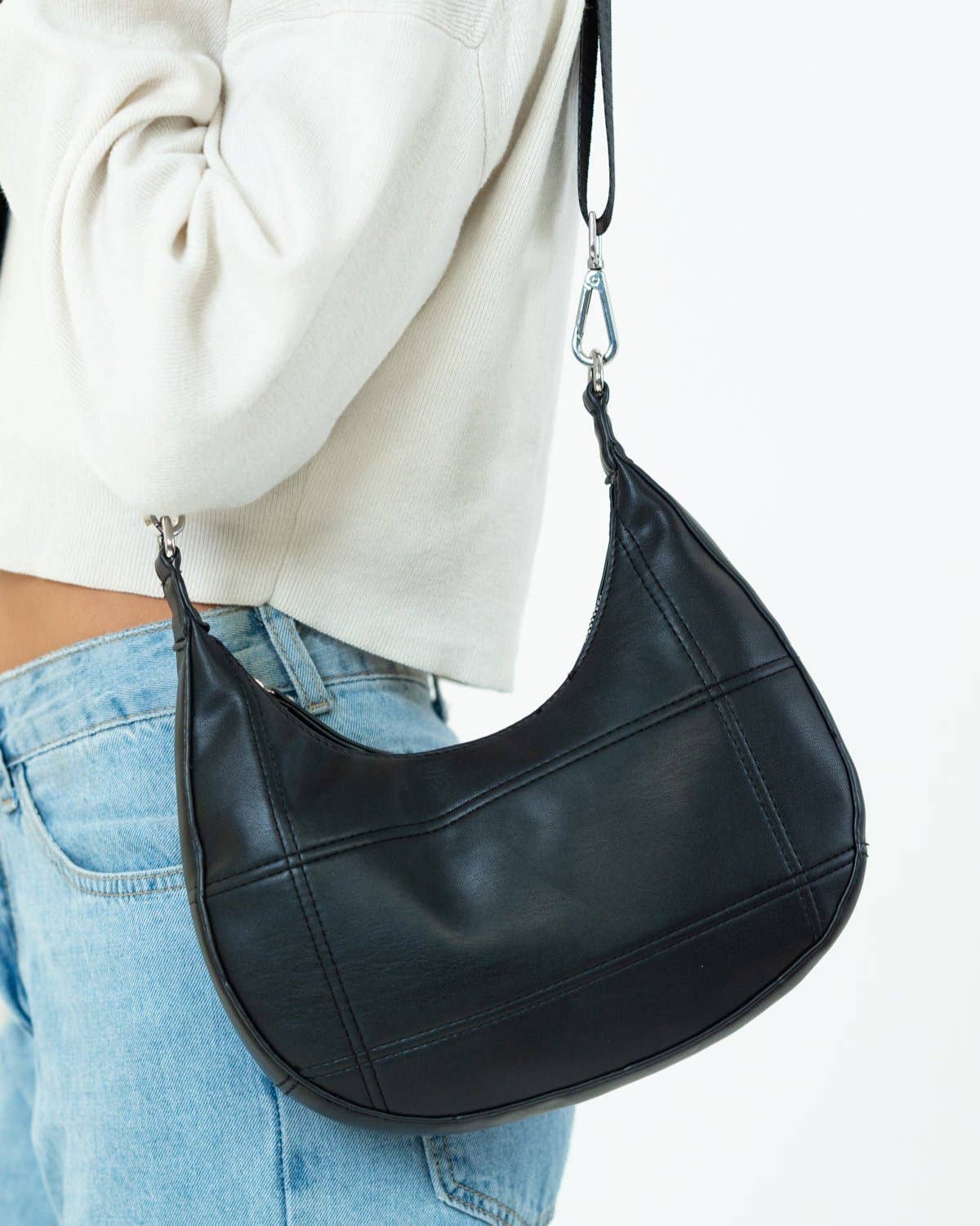 My Accessories London - Curved Quilted Leather-Look Sling Crossbody Bag in Black: Black