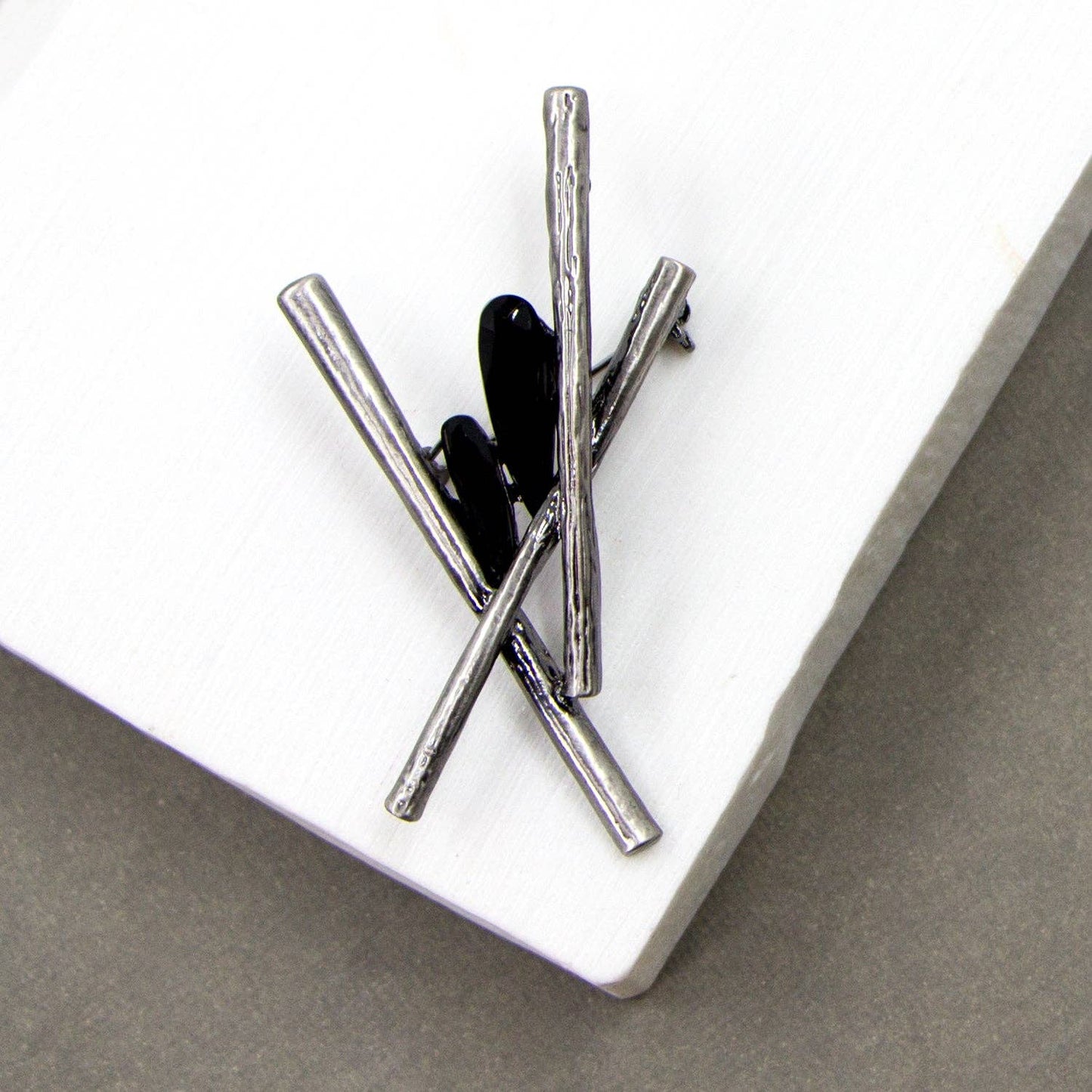 Tempest Designs - Contemporary criss cross brooch with jet crystal