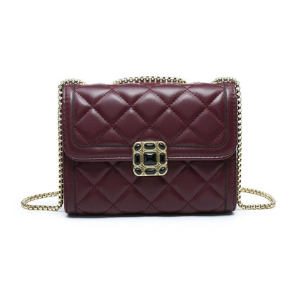 Crossbody bag with quilted pattern and beaded badge: Blue