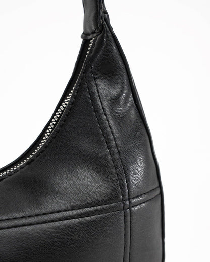 My Accessories London - Curved Quilted Leather-Look Sling Crossbody Bag in Black: Black